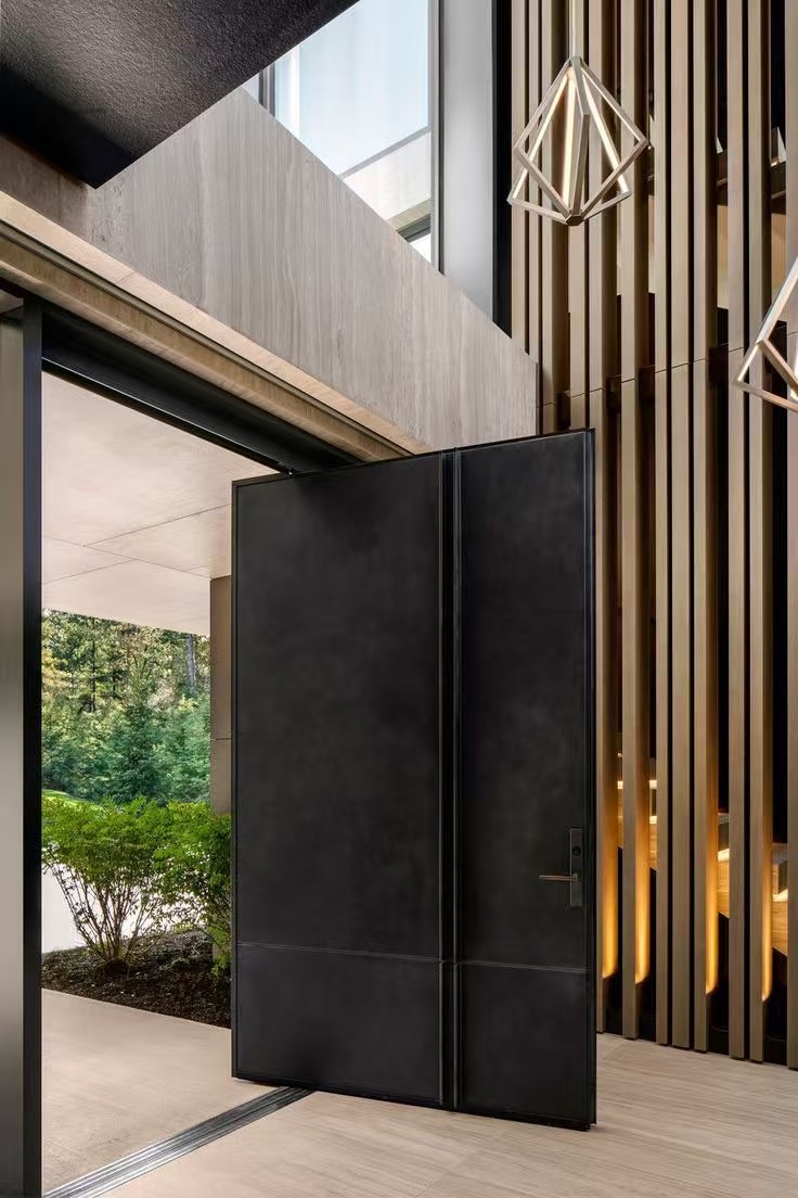 TINNO Minimalist Pivot Entry Doors | Sleek Industrial Luxury for Modern Residenc