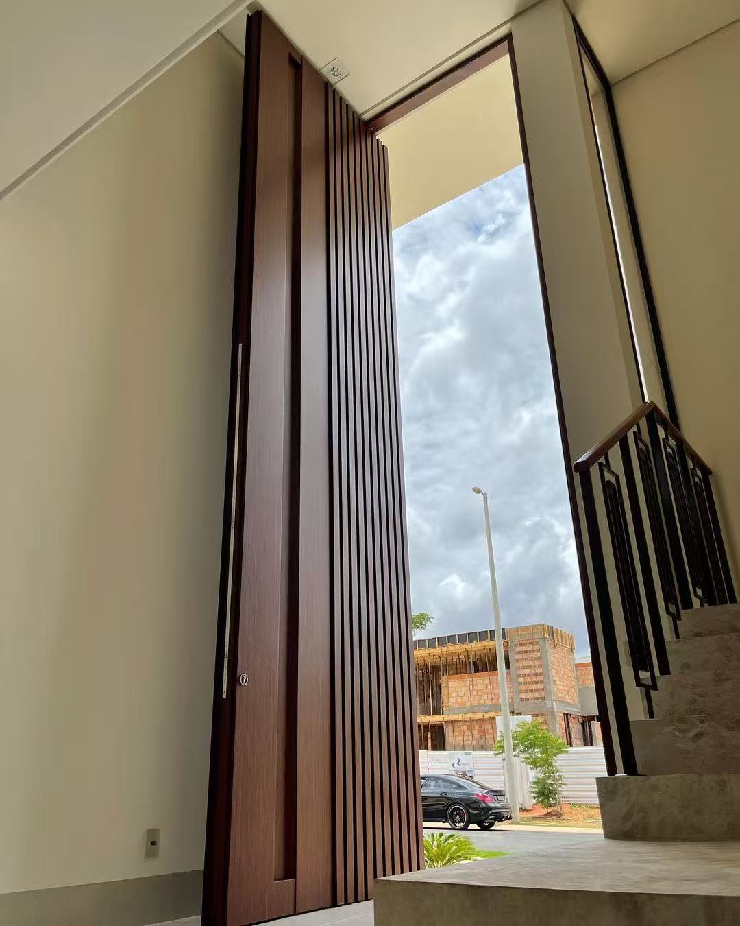 TINNO Vertical Slat Pivot Entry Doors | Sleek Modern Design for Contemporary Hom