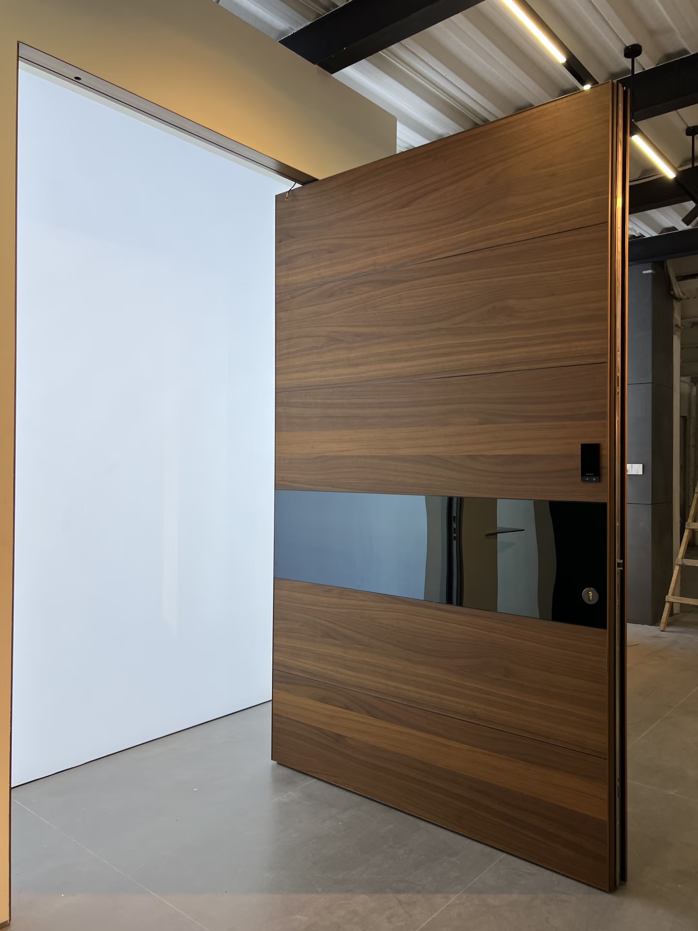 TINNO Walnut & Glass Pivot Entry Doors | Modern Luxury for Open-Concept Spaces